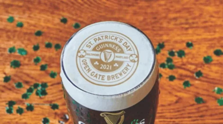 Pint with Ripples print showcasing St Paddy's Day event, surrounded by shamrock glitter
