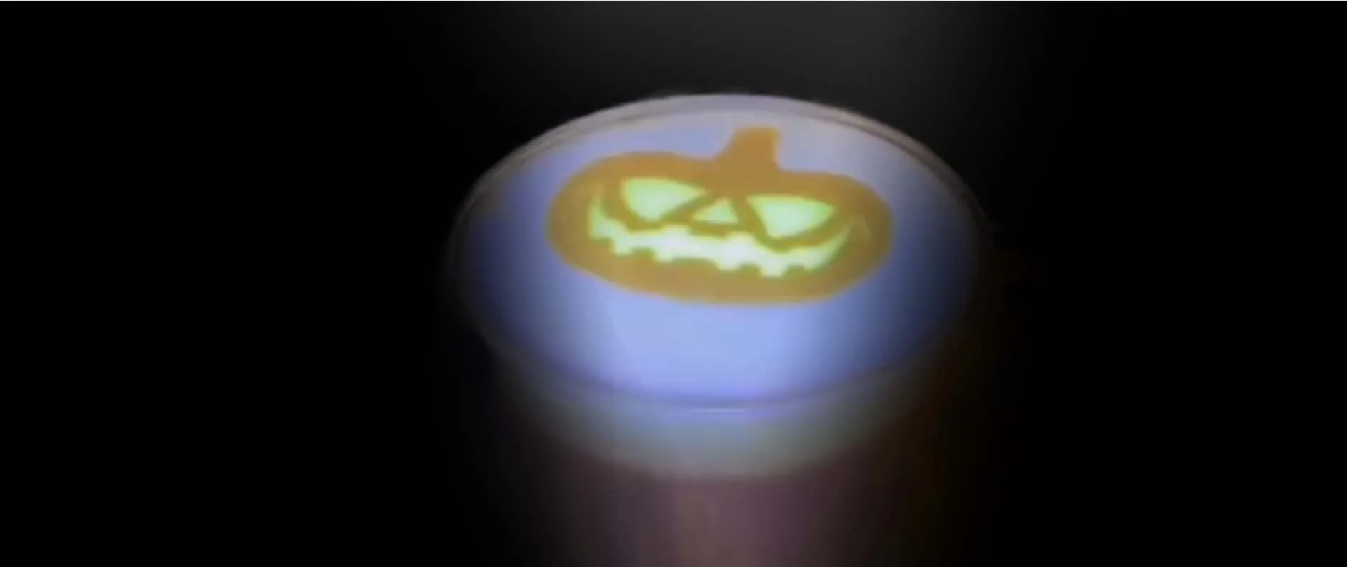 Glow-in-the-dark pumpkin latte